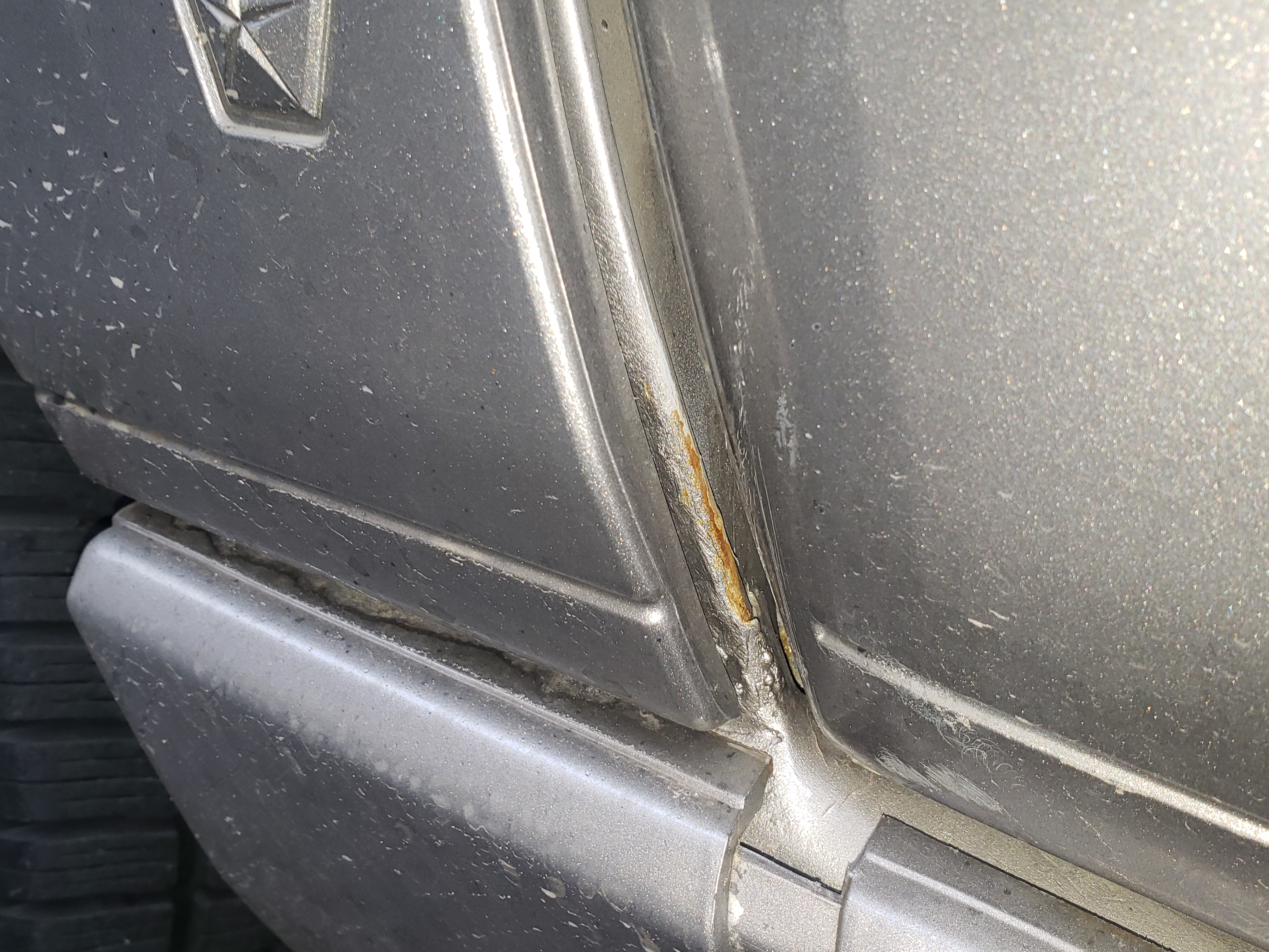 Rear door corner rust