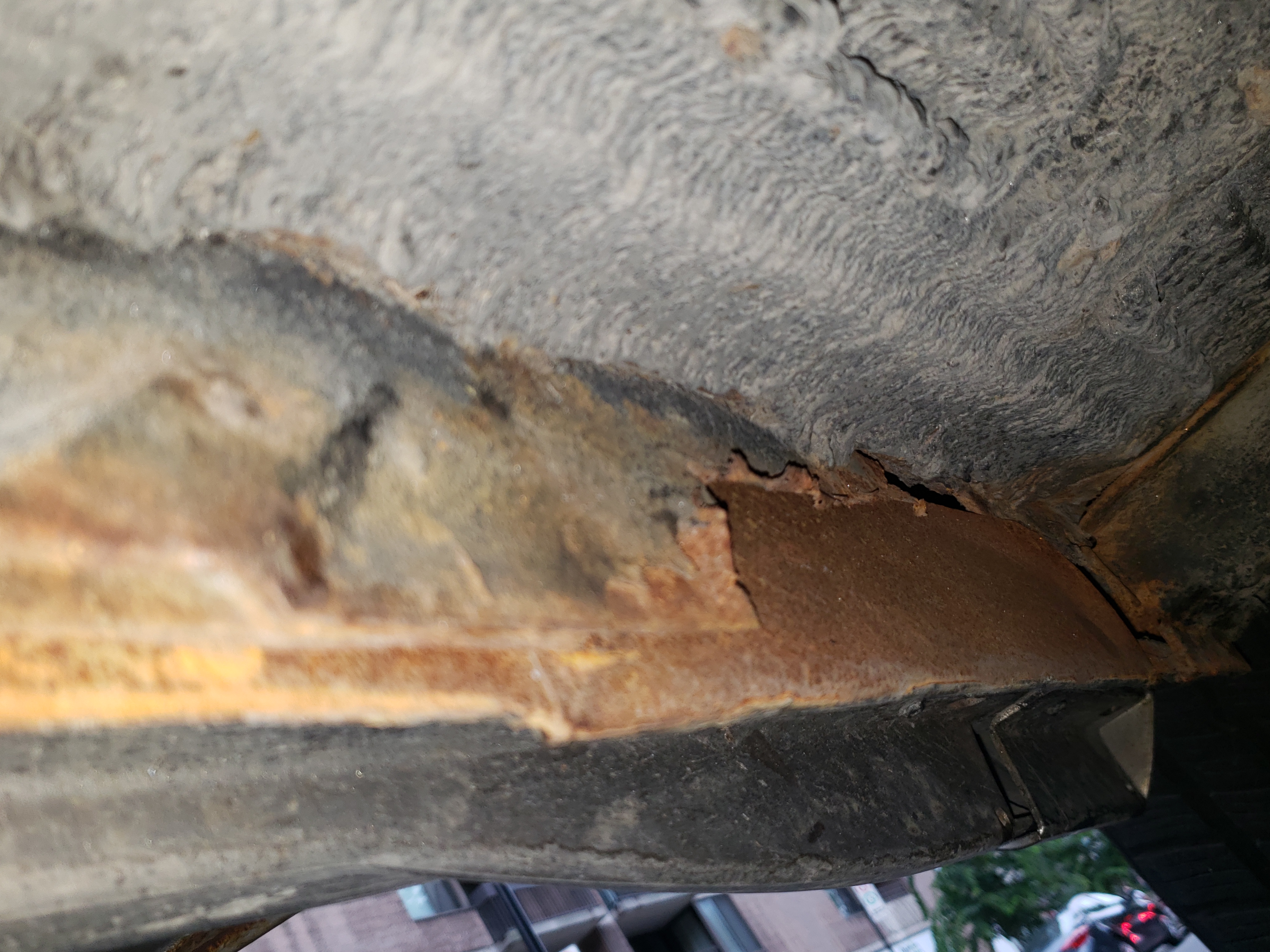 Rocker/frame junction — significant rust